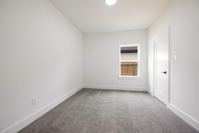 3900 De Maggio Ave, Dallas, TX 75210 - spare room with carpet floors and baseboards