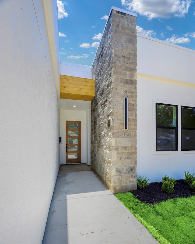 3900 De Maggio Ave, Dallas, TX 75210 - view of exterior entry featuring stucco siding
