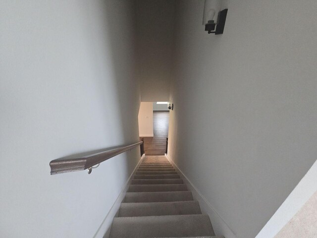 stairway with baseboards