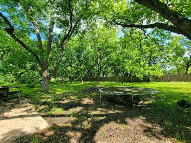 1208 W Broadway, Clarksville, TX 75426 - view of yard featuring a trampoline