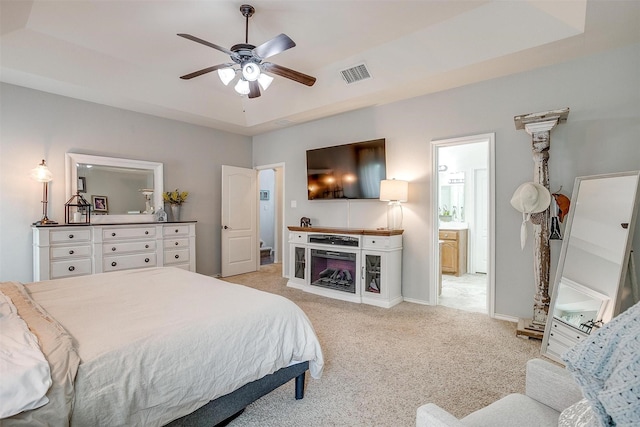 558 Ascot Way, Azle, TX 76020 - bedroom with light colored carpet, connected bathroom, baseboards, and a ceiling fan