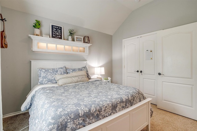 558 Ascot Way, Azle, TX 76020 - bedroom with light colored carpet, lofted ceiling, and a closet