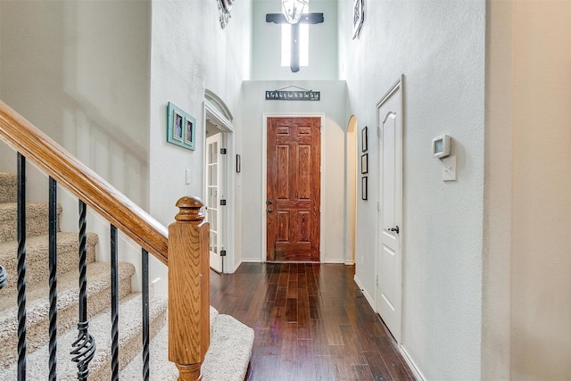 558 Ascot Way, Azle, TX 76020 - entryway with a high ceiling, stairway, wood-type flooring, and baseboards