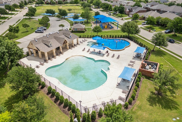 2377 Sunshine Dr, Little Elm, TX 75068 - community pool featuring fence, a patio, and a residential view