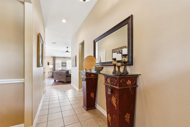 2377 Sunshine Dr, Little Elm, TX 75068 - hallway featuring light tile patterned flooring and baseboards