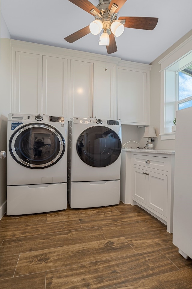 5050 Helton Rd, Justin, TX 76247 - laundry room with cabinet space, separate washer and dryer, a ceiling fan, and dark wood-style flooring