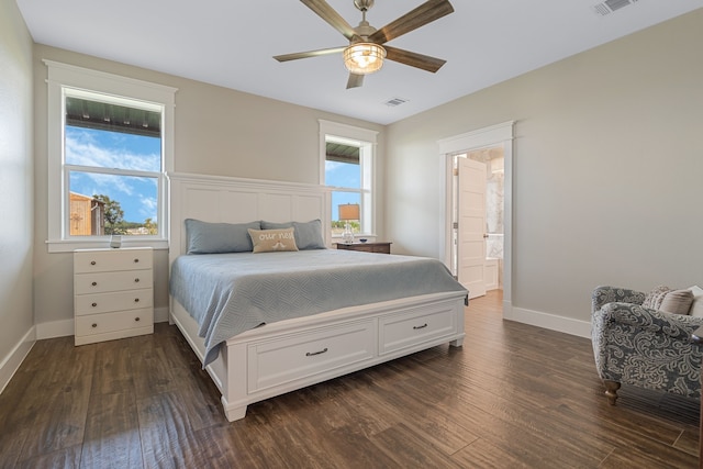 5050 Helton Rd, Justin, TX 76247 - bedroom featuring dark wood finished floors, connected bathroom, and a ceiling fan