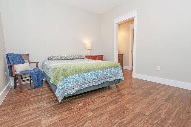 5050 Helton Rd, Justin, TX 76247 - bedroom with wood finished floors and baseboards
