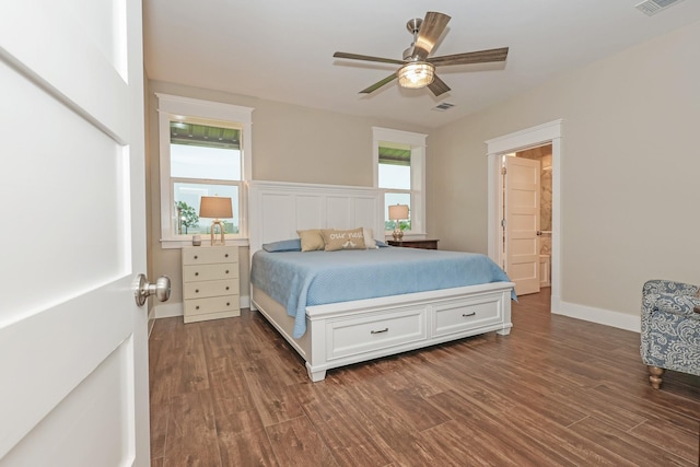 5050 Helton Rd, Justin, TX 76247 - bedroom featuring wood finished floors, ceiling fan, and ensuite bathroom