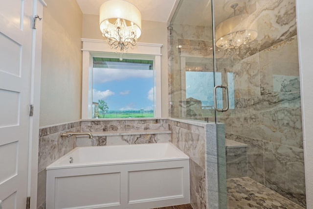 5050 Helton Rd, Justin, TX 76247 - full bathroom featuring a chandelier, a shower stall, and a garden tub