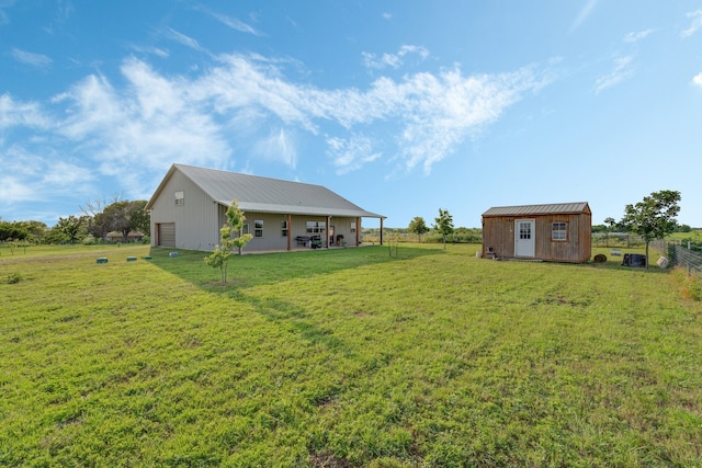 5050 Helton Rd, Justin, TX 76247 - view of yard featuring a storage shed and a detached garage