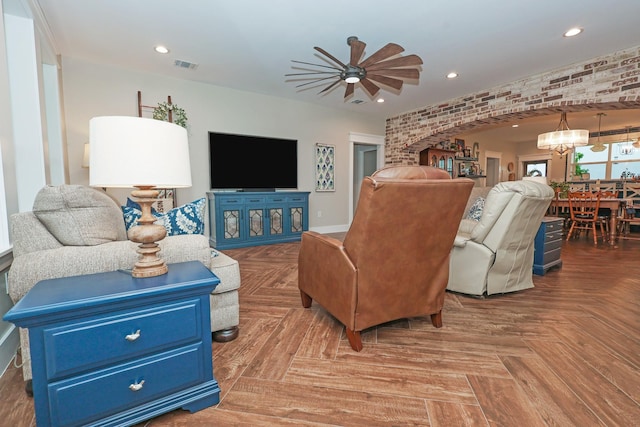5050 Helton Rd, Justin, TX 76247 - living area with ceiling fan, arched walkways, recessed lighting, and a chandelier