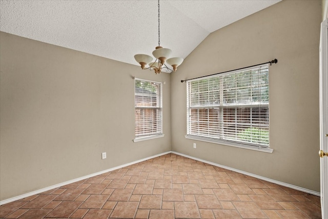 2617 Jacques Ln, Mckinney, TX 75070 - empty room featuring a chandelier, stone finish floors, baseboards, lofted ceiling, and a textured ceiling