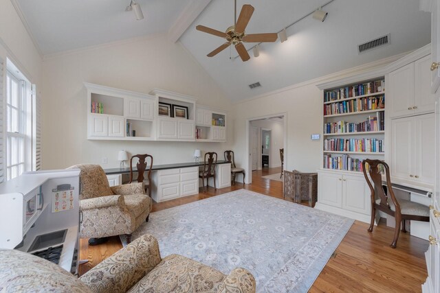 living area with a ceiling fan, light wood-style flooring, beam ceiling, and high vaulted ceiling