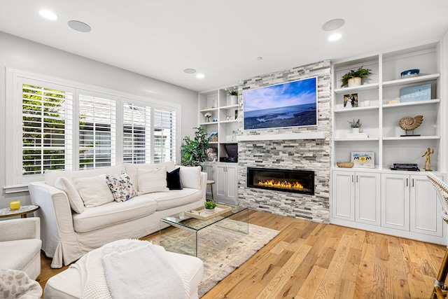 3420 Rosedale Ave Unit 6, University Park, TX 75205 - living room featuring plenty of natural light, light wood-type flooring, a fireplace, and recessed lighting