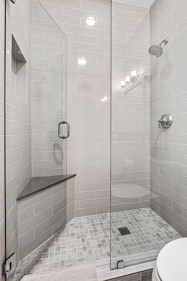 3420 Rosedale Ave Unit 6, University Park, TX 75205 - full bathroom featuring toilet and a stall shower