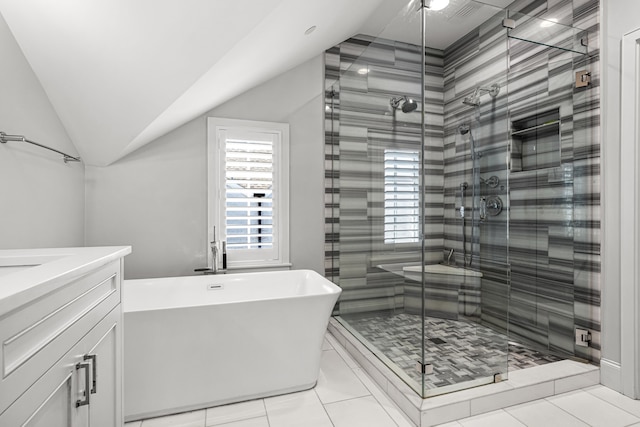 3420 Rosedale Ave Unit 6, University Park, TX 75205 - full bath with tile patterned flooring, a shower stall, a freestanding tub, lofted ceiling, and vanity