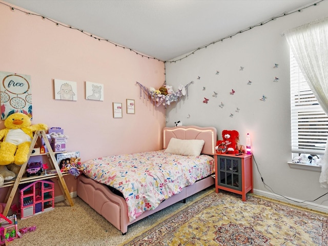 1111 Burlingame Dr, Cleburne, TX 76033 - bedroom featuring multiple windows and baseboards