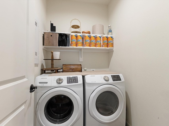 1111 Burlingame Dr, Cleburne, TX 76033 - laundry room featuring washer and dryer