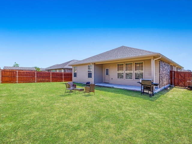 1111 Burlingame Dr, Cleburne, TX 76033 - back of house featuring a shingled roof and a patio