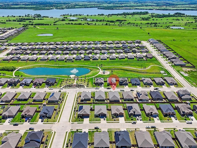 1111 Burlingame Dr, Cleburne, TX 76033 - aerial perspective of suburban area with a large body of water