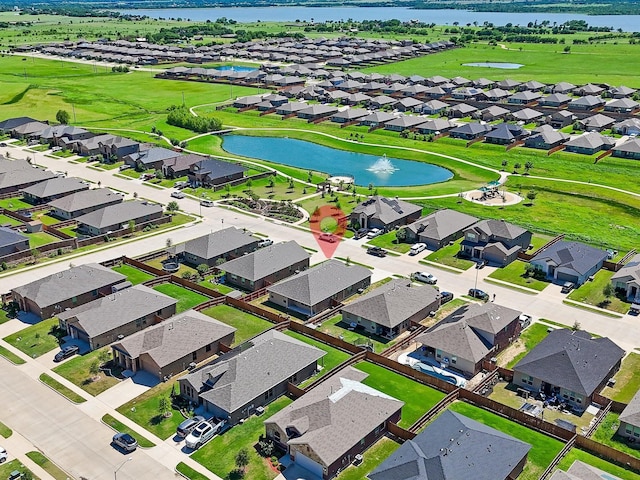 1111 Burlingame Dr, Cleburne, TX 76033 - aerial perspective of suburban area featuring a nearby body of water