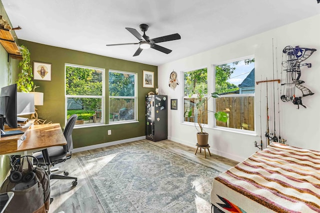 909 N 30th St, Waco, TX 76707 - bedroom featuring a desk, baseboards, and a ceiling fan