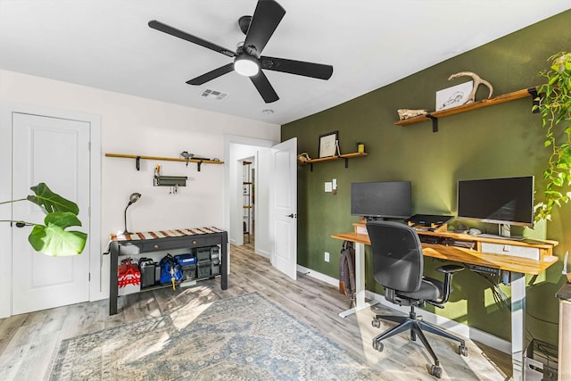 909 N 30th St, Waco, TX 76707 - home office with wood finished floors, ceiling fan, and baseboards