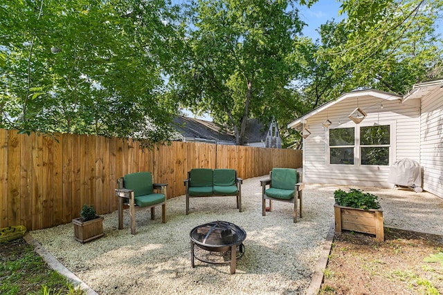 909 N 30th St, Waco, TX 76707 - view of patio with an outdoor fire pit and a fenced backyard