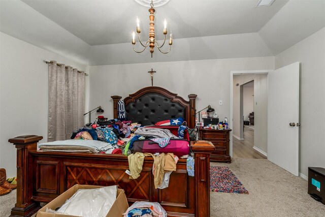 bedroom with carpet, a chandelier, and baseboards