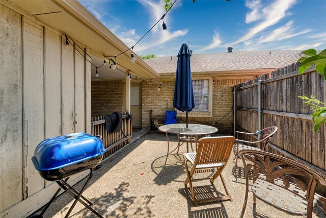 view of patio with fence