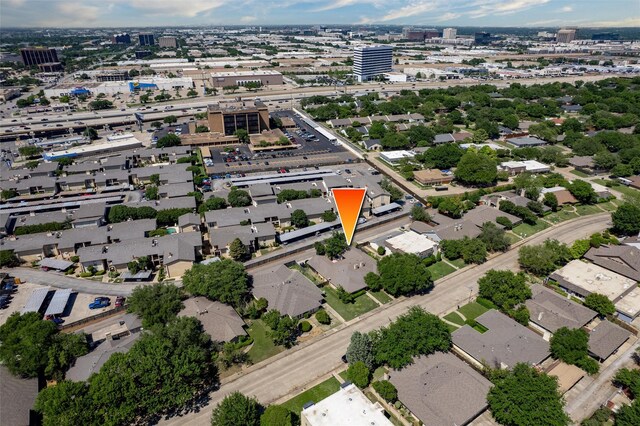 aerial view of property's location featuring nearby urban area