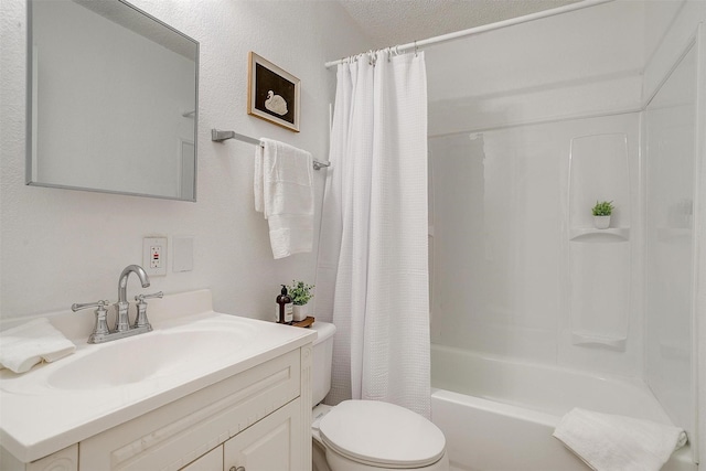 full bathroom featuring toilet, vanity, and shower / bath combo with shower curtain