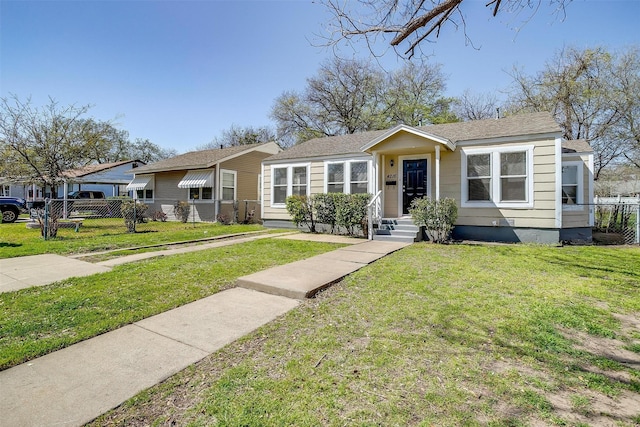 bungalow-style house featuring a shingled roof