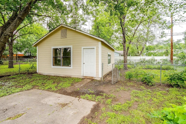 view of outbuilding with a fenced backyard