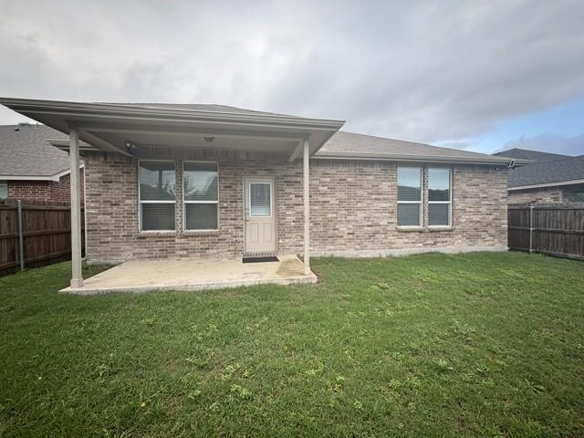 804 Underhill Dr, Arlington, TX 76002 - rear view of house featuring brick siding and a patio