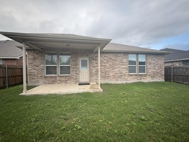 804 Underhill Dr, Arlington, TX 76002 - rear view of house featuring brick siding and a patio