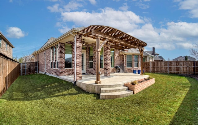 3609 Meridian Ave, Celina, TX 75009 - rear view of property featuring brick siding, a pergola, a patio area, and a ceiling fan