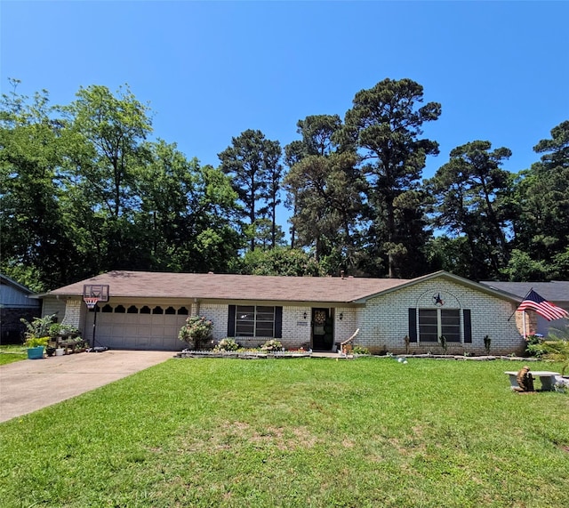 single story home featuring an attached garage, a front yard, driveway, and brick siding