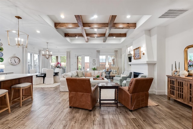 2218 Somercrest Pl, Midlothian, TX 76065 - living area with a chandelier, coffered ceiling, wood finished floors, beamed ceiling, and a fireplace