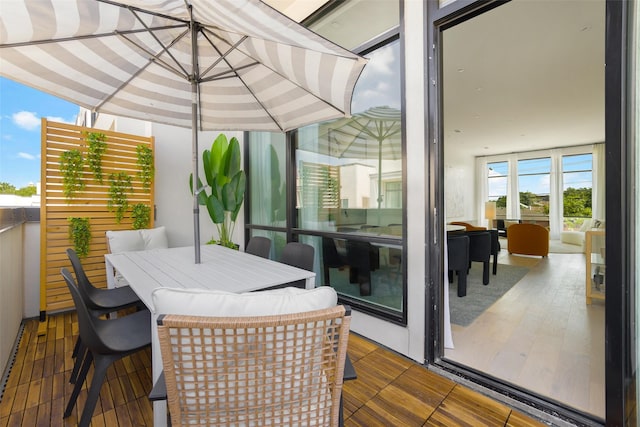 610 N Oak Cliff Blvd Unit 205, Dallas, TX 75208 - wooden deck with outdoor dining area