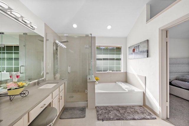 2410 Hedgeway Cir, Garland, TX 75044 - bathroom with a shower stall, a bath, tile patterned floors, vanity, and recessed lighting