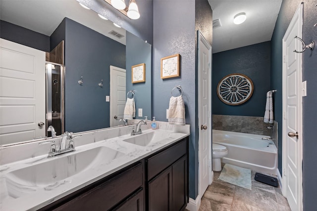 1461 Lakeview Dr, Pelican Bay, TX 76020 - full bathroom with a textured wall, a garden tub, double vanity, toilet, and an enclosed shower