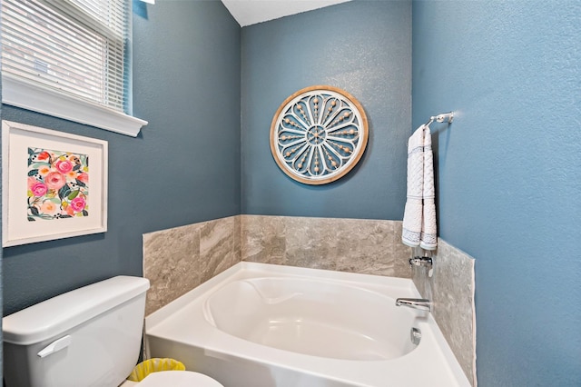 1461 Lakeview Dr, Pelican Bay, TX 76020 - bathroom with a garden tub, toilet, and a textured wall
