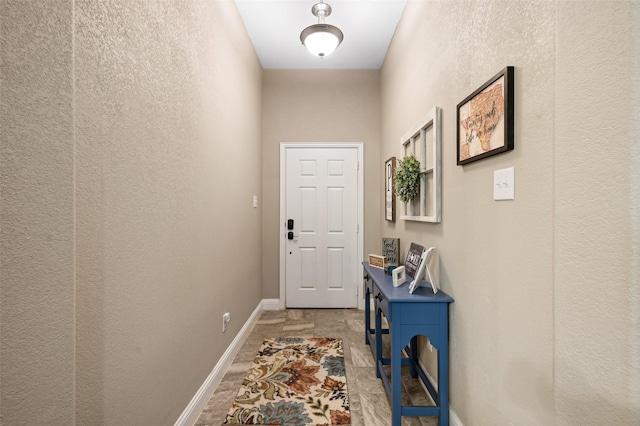 1461 Lakeview Dr, Pelican Bay, TX 76020 - doorway featuring baseboards and a textured wall