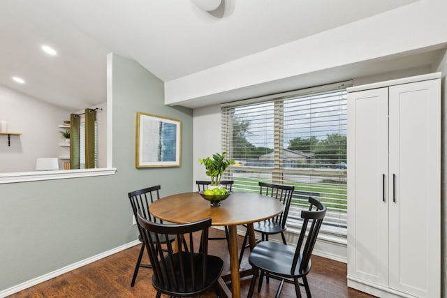 7116 Independence Dr, The Colony, TX 75056 - dining area featuring lofted ceiling, dark wood-style floors, and baseboards