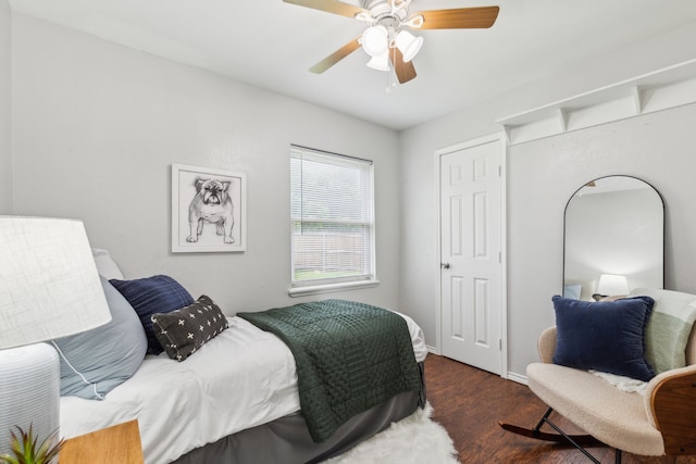 7116 Independence Dr, The Colony, TX 75056 - bedroom featuring wood finished floors, baseboards, and a ceiling fan