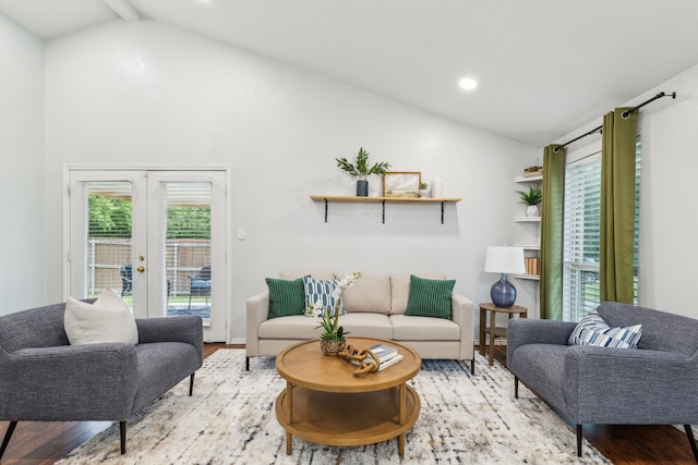 7116 Independence Dr, The Colony, TX 75056 - living area with french doors, wood finished floors, recessed lighting, high vaulted ceiling, and beamed ceiling