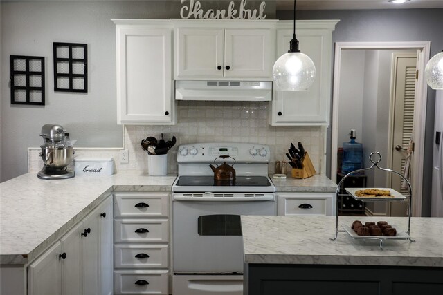 kitchen with under cabinet range hood, white electric stove, decorative backsplash, light countertops, and white cabinetry