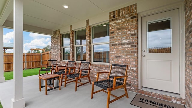 4109 Azam Ln, Fort Worth, TX 76036 - view of patio / terrace featuring a porch and fence